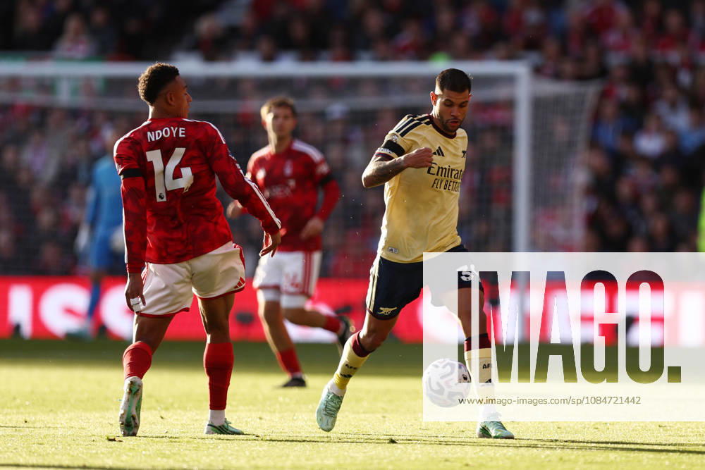 Nottingham, England, 18th October 2026. Bruno Guimaraes of Arsenal with the ball under pressure from Dan Ndoye of Nottingham Forest during the Nottingham Forest vs Arsenal Premier League match at the City Ground, Nottingham. Picture credit should read: Jake Youle Sportimage . SPI_022_JY_Forest_Arsenal SPI-5083-0022