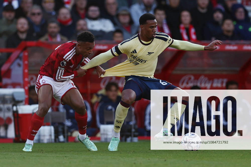 Nottingham, England, 18th October 2026. Dan Ndoye of Nottingham Forest and Gabriel of Arsenal challenge for the ball during the Nottingham Forest vs Arsenal Premier League match at the City Ground, Nottingham. Picture credit should read: Jake Youle Sportimage . SPI_024_JY_Forest_Arsenal SPI-5083-0024