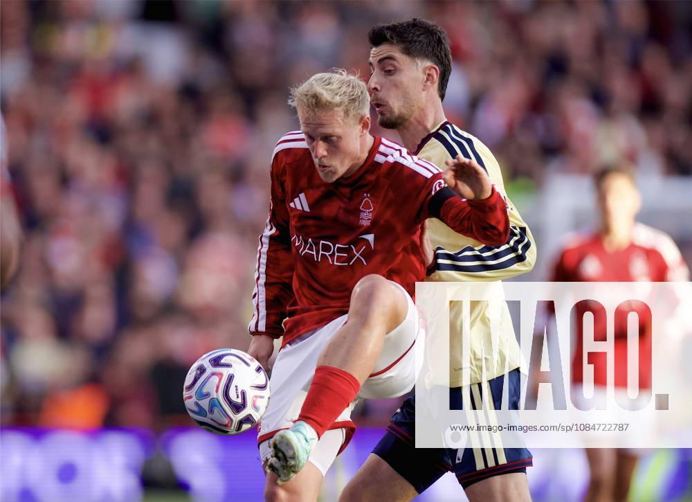 Football - FA Premier League - Nottingham Forest FC v Arsenal FC NOTTINGHAM, ENGLAND - Sunday, October 18, 2026: Nottingham Forest s Xaver Schlager (L) is challenged by Arsenal s Kai Havertz during the FA Premier League match between Nottingham Forest FC and Arsenal FC at the City Ground. (Photo by David Rawcliffe Propaganda) NOTTINGHAM City Ground NOTTINGHAMSHIRE ENGLAND