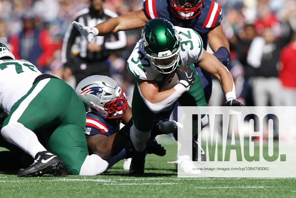 New York Jets running back Isaiah Davis, right, is taken down by New England Patriots guard Ben Brown during the first half at Gillette Stadium in Foxborough, Massachusetts on Sunday, October 18, 2026. BOP20261018002 CJxGUNTHER
