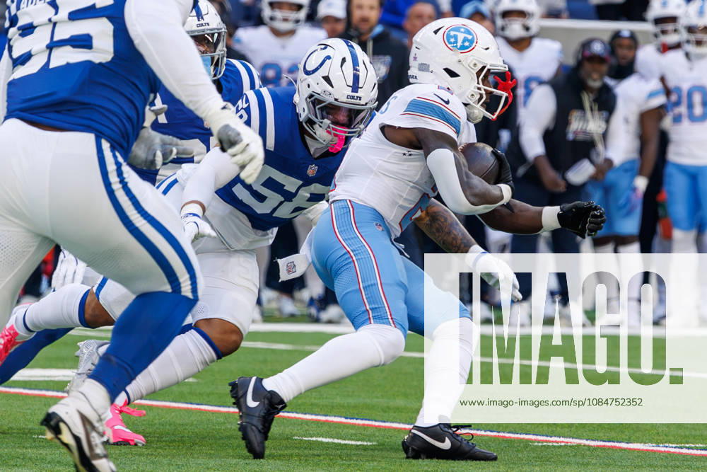 Indianapolis, Indiana, U.S: Tennessee Titans running back Tyjae Spears (2) carries the ball and is tackled by Indianapolis Colts linebacker Austin Ajiake (58) during the game between the Tennessee Titans and the Indianapolis Colts at Lucas Oil Stadium, Indianapolis, Indiana. Indianapolis U.S - ZUMAs304 20261018_zaf_s304_011