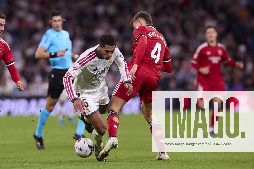 Jude Bellingham (Real Madrid CF) and Kike Salas (Sevilla FC) are seen in action during the LaLiga EA SPORTS 2026 2027 match between Real Madrid CF and Sevilla FC..Final score: Real Madrid CF 4-1 Sevilla FC. LaLiga EA SPORTS 2026 2027 - Real Madrid CF And Sevilla FC In Madrid, Spain - 18 Oct 2026 - ZUMAs197 20261018_aaa_s197_226
