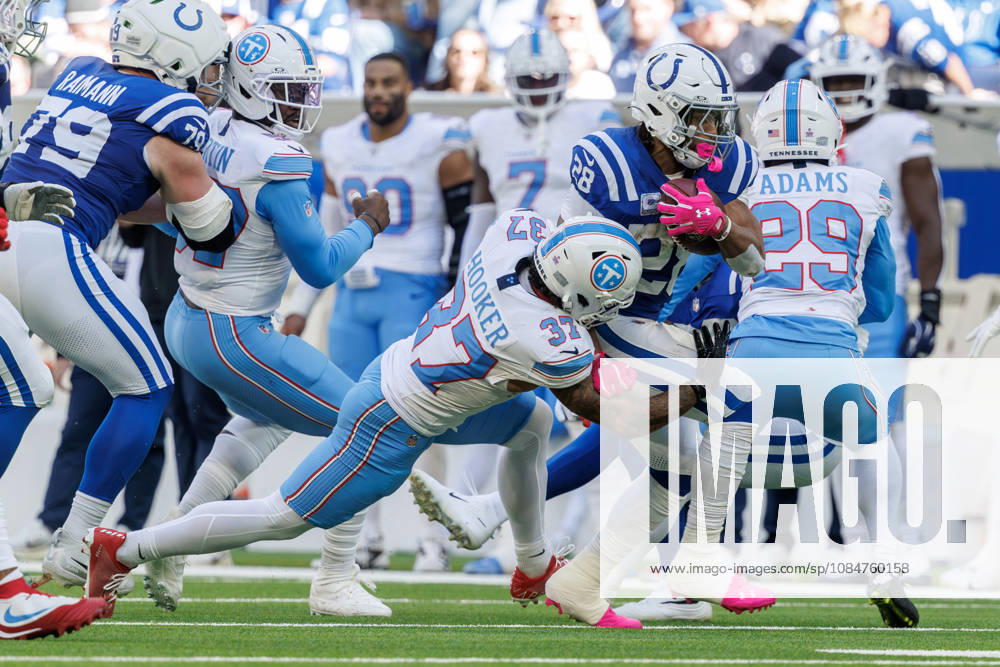 Indianapolis, Indiana, U.S: Indianapolis Colts running back Jonathan Taylor (28) is tackled by Tennessee Titans safety Amani Hooker (37) on a run during the game between the Tennessee Titans and the Indianapolis Colts at Lucas Oil Stadium, Indianapolis, Indiana. NFL, American Football Herren, USA 2026 Titans 26-20 Colts - ZUMAs304 20261018_zaf_s304_059