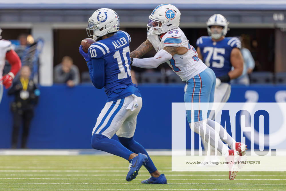Indianapolis, Indiana, U.S: Indianapolis Colts wide receiver Keenan Allen (10) catches a pass in front of Tennessee Titans safety Amani Hooker (37) during the game between the Tennessee Titans and the Indianapolis Colts at Lucas Oil Stadium, Indianapolis, Indiana. Indianapolis U.S - ZUMAs304 20261018_zaf_s304_065