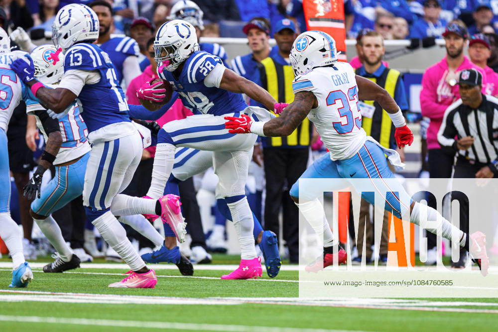 Oct 18, 2026; Indianapolis, IN, USA; Indianapolis Colts running back Jonathan Taylor (28) runs with the ball as Tennessee Titans linebacker Cedric Gray (33) pursues during NFL, American Football Herren, USA game action at Lucas Oil Stadium. Mandatory Credit: -Cal Media NFL 2026: Titans Vs Colts OCT 18 - ZUMAc04_ 20261018_zma_c04_309