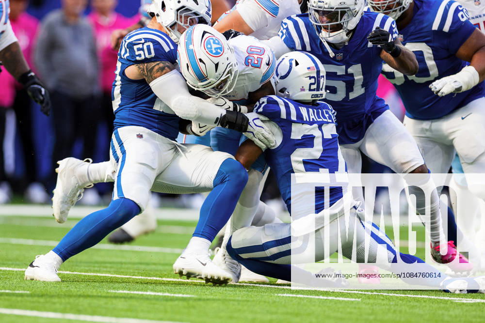 Oct 18, 2026; Indianapolis, IN, USA; Tennessee Titans running back Tony Pollard (20) runs with the ball as Indianapolis Colts cornerback Justin Walley (27) attempts to make the tackle during NFL, American Football Herren, USA game action at Lucas Oil Stadium. Mandatory Credit: -Cal Media NFL 2026: Titans Vs Colts OCT 18 - ZUMAc04_ 20261018_zma_c04_328