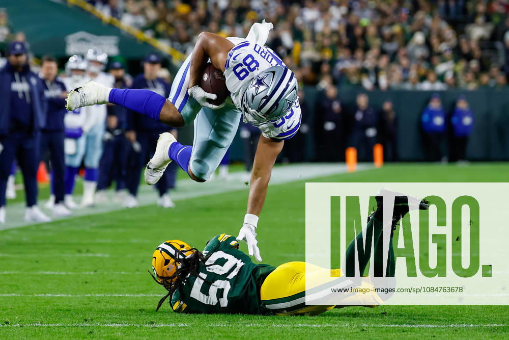 Oct 18, 2026; Green Bay, WI, USA; Dallas Cowboys tight end Brevyn Spann-Ford (89) is tackled by Green Bay Packers linebacker Ty ron Hopper (59) during the NFL, American Football Herren, USA game at Lambeau Field. Mandatory Credit: -Cal Media. NFL 2026: Cowboys Vs Packers OCT 18 - ZUMAc04_ 20261018_zma_c04_461
