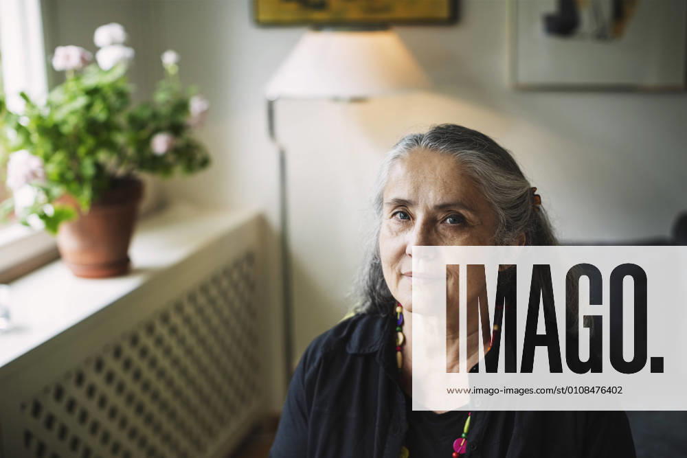 Portrait of confident senior woman at home , model released, property released
