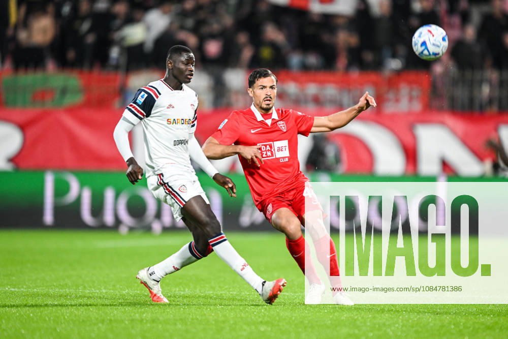Andrea Carboni of AC Monza fights for the ball with Paul Mendy of Cagliari Calcio during the Serie A soccer match between AC Monza and Cagliari Calcio the Brianteo Stadium in Monza, north Italy - October 19, 2026. - Soccer.