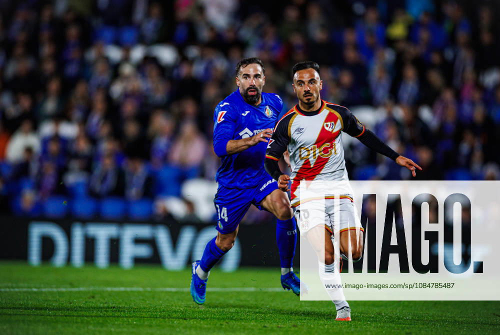 Getafe CF vs Rayo Vallecano - LaLiga EA Sports - 19 10 2026 Dani Carvajal of Getafe CF (L) battles for the ball with Alvaro Garcia of Rayo Vallecano during the LaLiga EA Sports match between Getafe CF and RC Rayo Vallecano at Coliseum Stadium on October 19, 2026 in Madrid, Spain. Getafe Spain