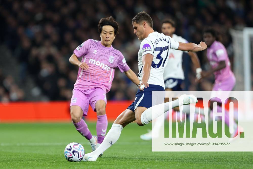 Micky van de Ven of Tottenham Hotspur passes the ball under pressure from Tatsuhiro Sakamoto of Coventry City Tottenham Hotspur v Coventry City, Premier League, Football, Tottenham Hotspur Stadium, London, UK, 19 10 2026, England - 19 Oct 2026London Tottenham Hotspur Stadium England United Kingdom