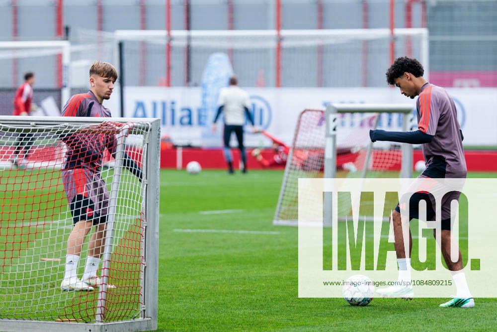 Lennart Karl (FC Bayern Muenchen, 42) and Nathaniel Brown(FC Bayern Muenchen, 11) playing around with a ball during the training session before the UEFA Champions League match between FC Bayern Muenchen vs. Arsenal FC at Trainingsgelaende an der Saebener Str on October 20, 2026 in Munich, Germany. Bavaria Germany