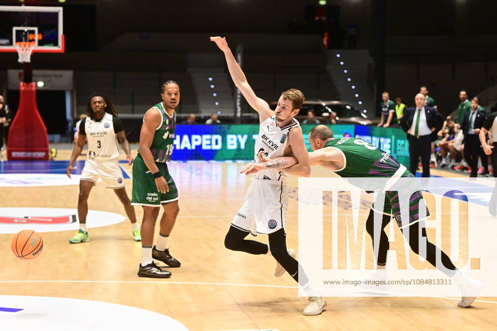 Jakub Tuma (Pardubice), middle, and Ignas Brazdeikis (Malaga), right, in action during men s Basketball Champions League, group E, 2nd round, BK KVIS Pardubice vs Unicaja Malaga, in Pardubice, Czech Republic, October 20, 2026. (CTKxPhoto JosefxVostarek) CTKPhotoP2026102006540 CTKPhotoP2026102006540