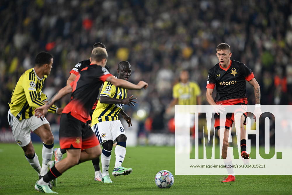 Fenerbahce v Slavia Praha - UEFA Champions League ISTANBUL, TURKIYE - OCTOBER 20: N Golu Kante (91) of Fenerbahce in action against Wiktor Nowak of Slavia Praha during the UEFA Champions League Week 3 match between Fenerbahce and Slavia Prag at Chobani Stadium, on October 20, 2026 in Istanbul, Turkiye. Oguz Yeter Anadolu Istanbul Turkey. Editorial use only. Please get in touch for any other usage.