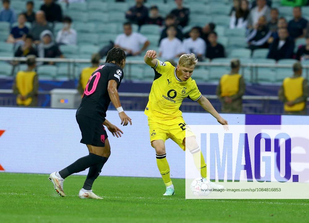 Sabah FC v Borussia Dortmund - UEFA Champions League BAKU, AZERBAIJAN - OCTOBER 20: Akim Zedadka of Sabah FC in action against Daniel Svensson of Borussia Dortmund during UEFA Champions League week 3 football match between Sabah FC and Borussia Dortmund at Baku Olympic Stadium in Baku, Azerbaijan on October 20, 2026. Resul Rehimov Anadolu Baku Azerbaijan. Editorial use only. Please get in touch for any other usage.