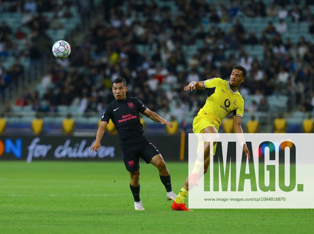 Sabah FC v Borussia Dortmund - UEFA Champions League BAKU, AZERBAIJAN - OCTOBER 20: Umarali Rahmanaliyev of Sabah FC in action against Felix Namecha of Borussia Dortmund during UEFA Champions League week 3 football match between Sabah FC and Borussia Dortmund at Baku Olympic Stadium in Baku, Azerbaijan on October 20, 2026. Resul Rehimov Anadolu Baku Azerbaijan. Editorial use only. Please get in touch for any other usage.