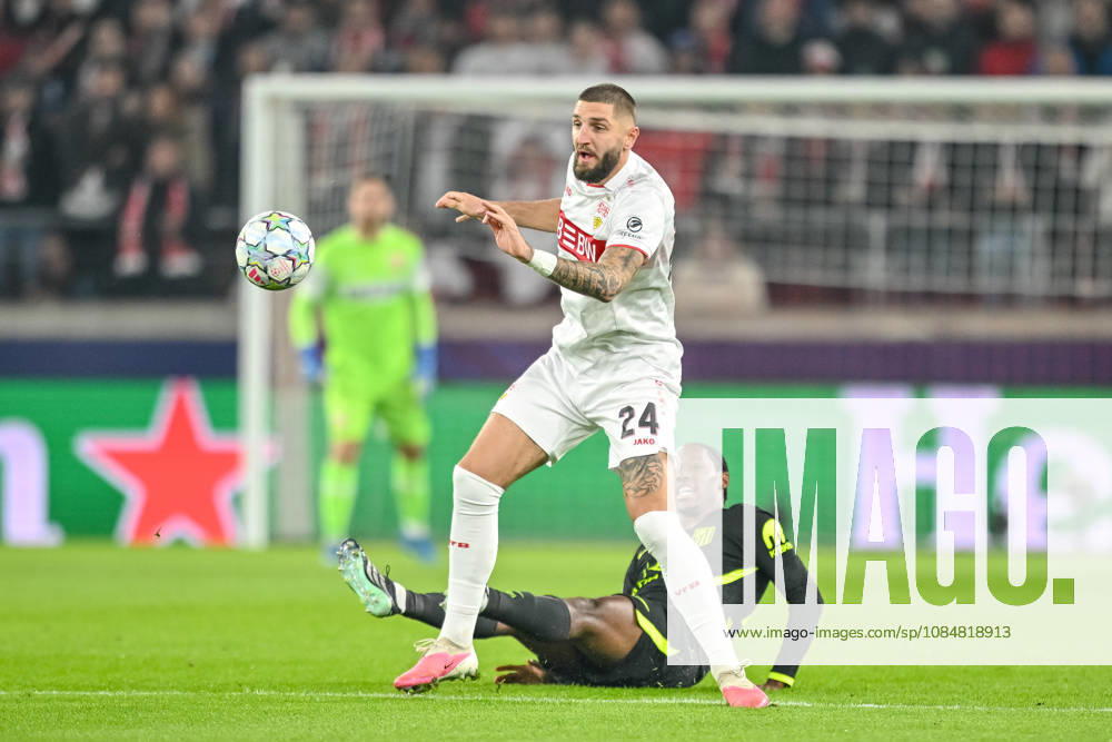 Jeff Chabot (VfB Stuttgart) and Jonathan David (Atletico Madrid) battle for the ball during the UEFA Champions League 2026 2027 match between Stuttgart and Atlético de Madrid at Arena Stuttgart on October 20, 2026 in Stuttgart, Germany. (Photo by Harry Langer DeFodi Images) -