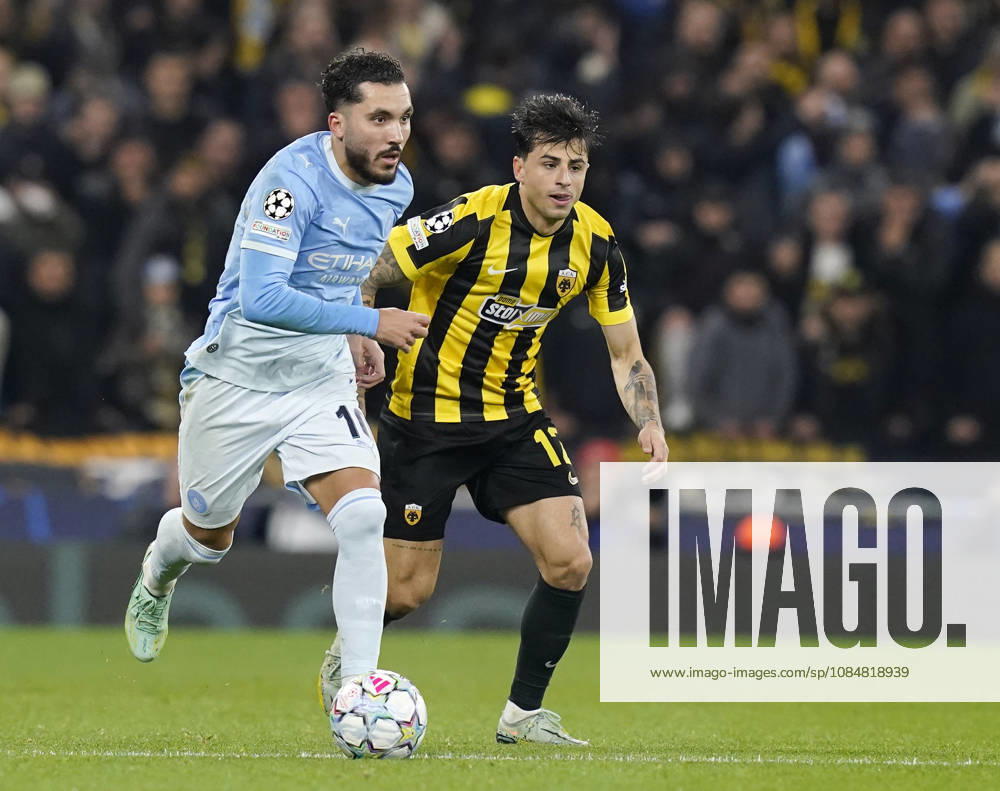 Manchester, England, 20th October 2026. Rayan Cherki of Manchester City and Lazaros Rota of AEK Athens during the Manchester City vs AEK Athens UEFA Champions League match at the Etihad Stadium, Manchester. Picture credit should read: Andrew Yates Sportimage . SPI_025_AY_ManCity__Athens SPI-5090-0025