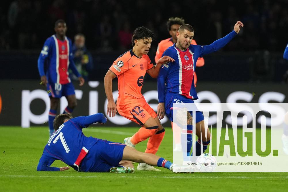 Khvicha Kvaratskhelia of PSG and Lucas Hernandez of PSG tackle Karim Adeyemi of Barcelona Paris Saint-Germain v Barcelona, UEFA Champions League, Football, Parc des Princes, Paris, France - 20 Oct 2026Paris Parc des Princes France