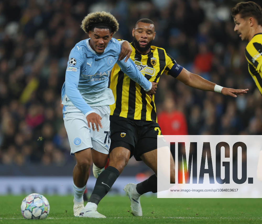 Manchester City v AEK Athens - UEFA Champions League 2026 27 League Phase MD3 Floyd Samba of Manchester City and Harold Moukoudi of AEK Athens challenge during the UEFA Champions League 2026 27 League Phase MD3 match between Manchester City and AEK Athens at City of Manchester Stadium on October 20, 2026 in Manchester, England. Manchester City of Manchester Stadium England United Kingdom