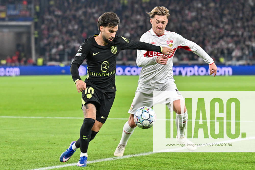 STUTTGART, GERMANY; 20. OCTOBER: tackle between Alex BAENA (Atletico Madrid 10) and Angelo STILLER (VfB Stuttgart 6) during the UEFA Champions League Match between VfB Stuttgart vs. Atletico Madrid at Matchday 3 at MHP Arena