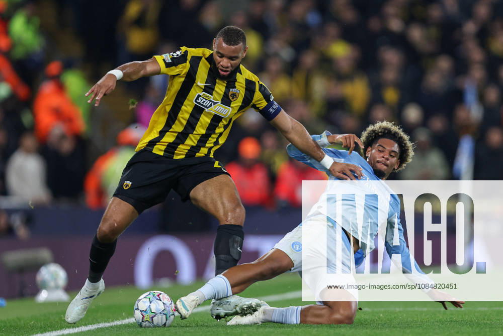 20th October 2026; Etihad Stadium, Manchester, England; UEFA Champions League Football, Manchester City versus AEK Athens; Floyd Samba of Manchester City tackles Harold Moukoudi of AEK Athens AidanxHunter