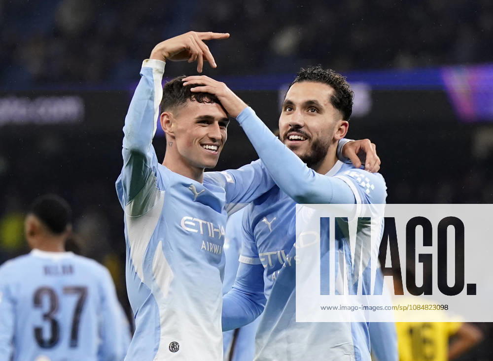 Manchester, England, 20th October 2026. Rayan Cherki of Manchester City (r) celebrates scoring their third goal (3-1) during the Manchester City vs AEK Athens UEFA Champions League match at the Etihad Stadium, Manchester. Picture credit should read: Andrew Yates Sportimage . SPI_044_AY_ManCity__Athens SPI-5090-0043