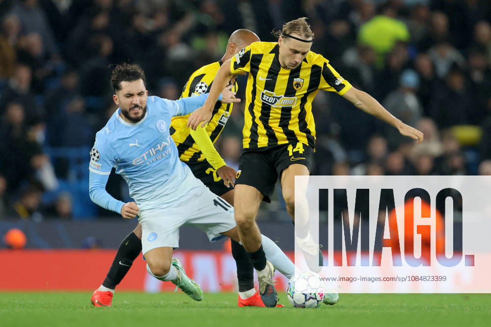 Manchester City v AEK Athens - UEFA Champions League 2026 27 League Phase MD3 Rayan Cherki of Manchester City and Lovro Majer of AEK Athens challenge during the UEFA Champions League 2026 27 League Phase MD3 match between Manchester City and AEK Athens at City of Manchester Stadium on October 20, 2026 in Manchester, England. Manchester City of Manchester Stadium England United Kingdom