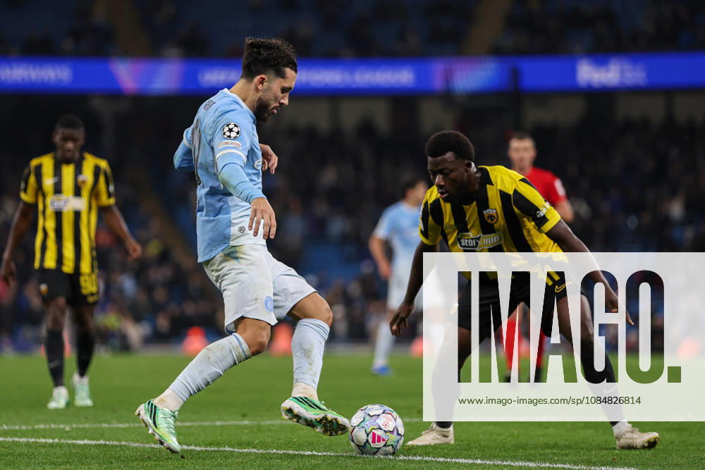 20th October 2026; Etihad Stadium, Manchester, England; UEFA Champions League Football, Manchester City versus AEK Athens; Rayan Cherki of Manchester City takes on Aboubakary Koita of AEK Athens AidanxHunter