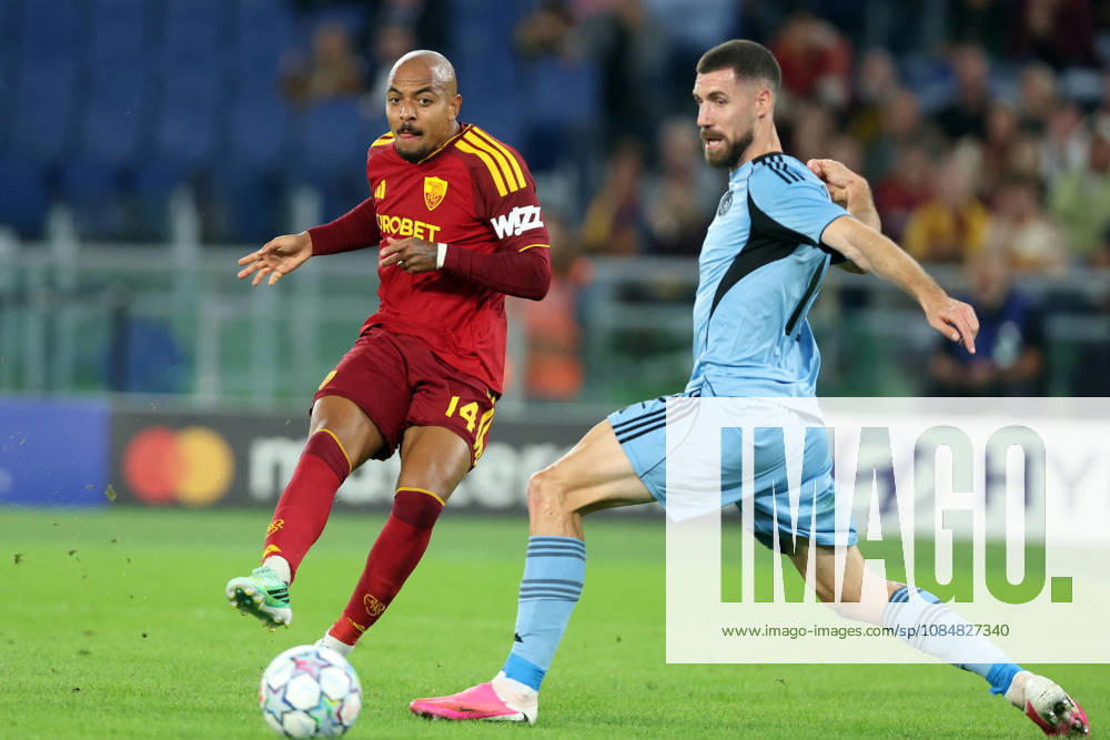 SOCCER - UEFA Champions League - AS Roma vs. Slovan Bratislava Photo by IPA ABACAPRESS.COM89963810 - Rome, Italy - October 20, 2026: Donyell Malen (center forward) of AS Roma and Kenan Bajric (center back) of SK Slovan Bratislava in action during a 2026-2027 UEFA Champions League soccer match between AS Roma and SLOVAN BRATISLAVA at the Olympic Stadium in Rome. Roma Italy
