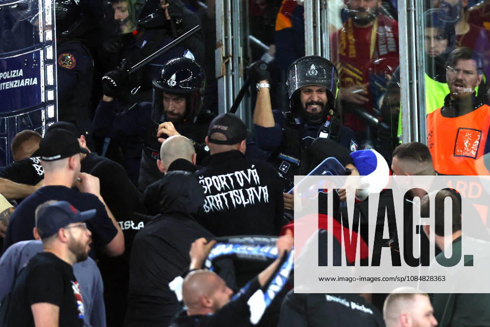 SOCCER - UEFA Champions League - AS Roma vs. Slovan Bratislava Photo by IPA ABACAPRESS.COM89965666 - Rome, Italy - October 20, 2026: Clashes between Bratislava fans and police during the 2026-2027 UEFA Champions League soccer match between AS Roma and SK Slovan Bratislava at the Olympic Stadium in Rome. Roma Italy