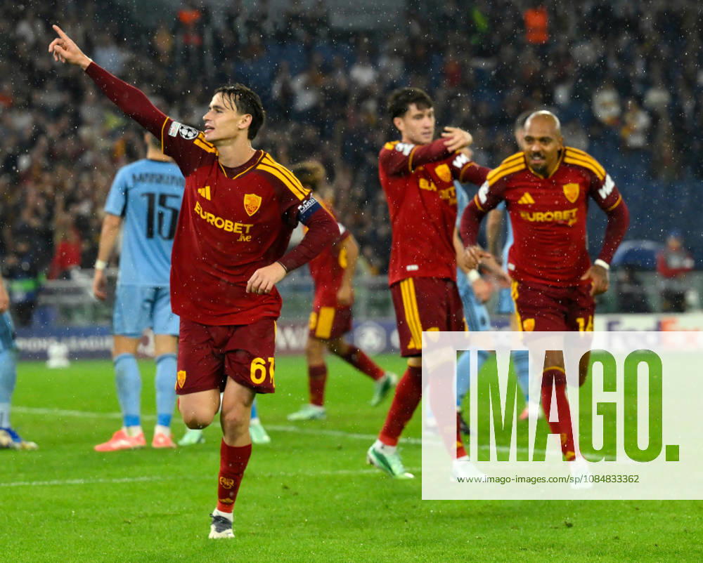 (261021) -- ROME, Oct. 21, 2026 -- Roma s Niccolo Pisilli (L) celebrates his goal during the UEFA Champions League football match between Roma and Slovan Bratislava in Rome, Italy, Oct. 20, 2026. (Photo by Xinhua) (SP)ITALY-ROME-FOOTBALL-UEFA CHAMPIONS LEAGUE-ROMA VS SLOVAN BRATISLAVA AlbertoxLingria