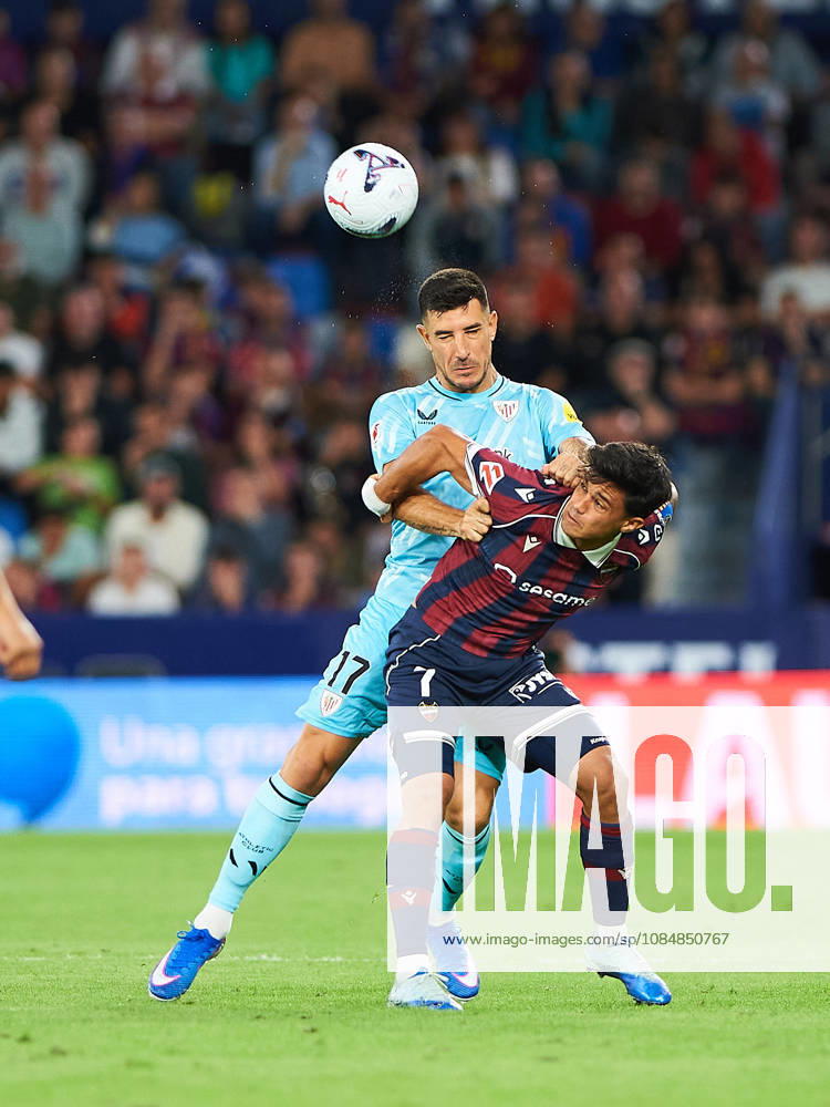 Yuri Berchiche (Athletic Club) and Roger Brugue (Levante UD) during the LaLiga EA Sports match between Levante UD and Athletic Club at Estadi Ciutat de València on October 21, 2026 in Valencia, Spain. -