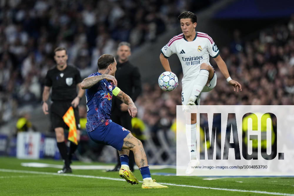 ESP: Real Madrid v RB Leipzig. UEFA Champions League. Matchday 3. David Raum of RB Leipzig and Arda Guler of Real Madrid CF during the UEFA Champions League match between Real Madrid and RB Leipzig played at Santiago Bernabeu Stadium on 21 Oct 2026 in Madrid, Spain. kpng