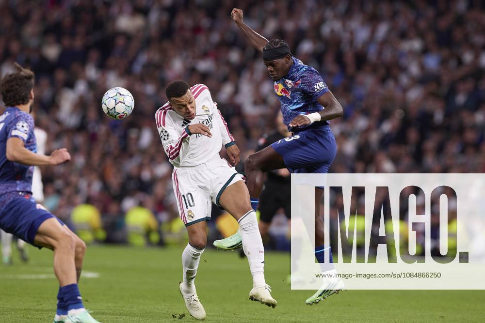 Kylian Mbappe (Real Madrid CF) and Castello Jr Lukeba (RB Leipzig) are seen in action during the UEFA Champions League 2026 2027 match between Real Madrid CF and RB Leipzig..Final score: Real Madrid 4-1 RB Leipzig. Madrid Spain - ZUMAs197 20261021_aaa_s197_424