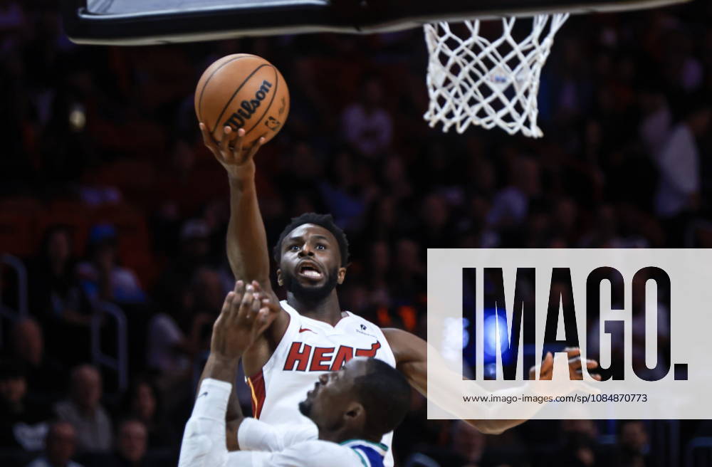 NBA, Basketball Herren, USA - Miami Heat vs Minnesota Timberwolves Miami Heat Forward Andrew Wiggins (top) in action during the NBA basketball game between the Miami Heat and Minnesota Timberwolves at the Kaseya Center in Miami, Florida, USA, 21 October 2026. MIAMI FLORIDA United States