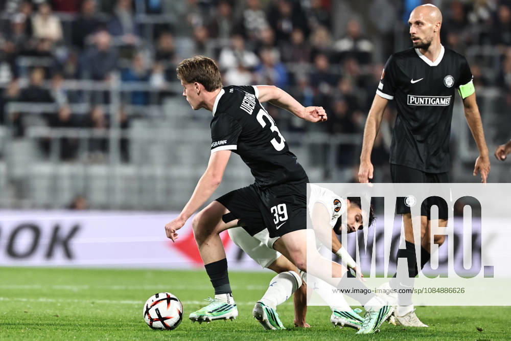 SOCCER - UEFA EL, Sturm vs Marseille GRAZ,AUSTRIA,22.OCT.26 - SOCCER - UEFA Europa League, SK Sturm Graz vs Olympique de Marseille. Image shows Luca Weinhandl (Sturm) and Neal Maupay (Marseille). GEPAxpictures Bauer