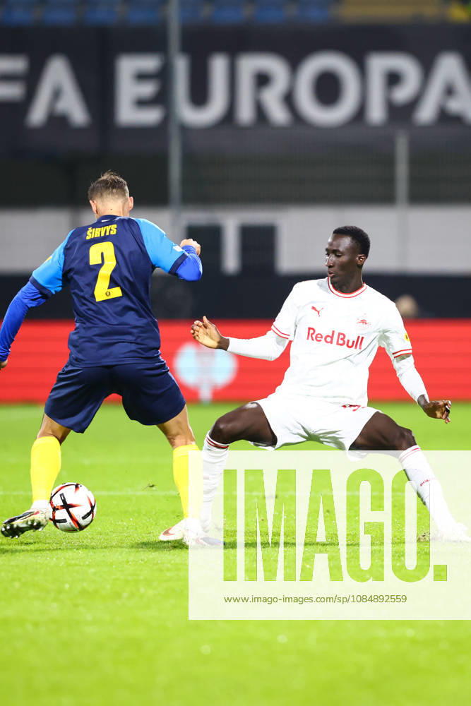SOCCER - UEFA EL, Celje vs RBS CELJE,SLOVENIA,22.OCT.26 - SOCCER - UEFA Europa League, NK Celje vs Red Bull Salzburg. Image shows Pijus Sirvys (Celje) and Abubakr Barry (Salzburg). GEPAxpictures Doak