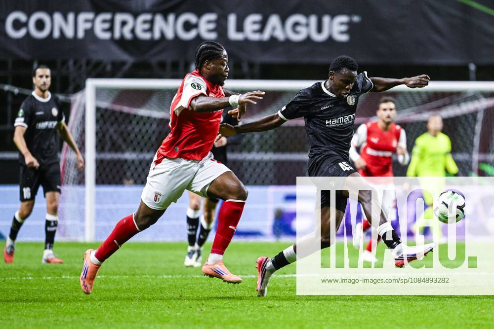 Bright Arrey-Mbi of SC Braga and Hyllarion Goore of KAA Gent pictured in action during a soccer game between Portuguese SC Braga and Belgian soccer team KAA Gent, Thursday 22 October 2026 in Braga, Portugal, the second match in the UEFA Conference League league phase. TOM GOYVAERTS TomxGoyvaerts x190689118x