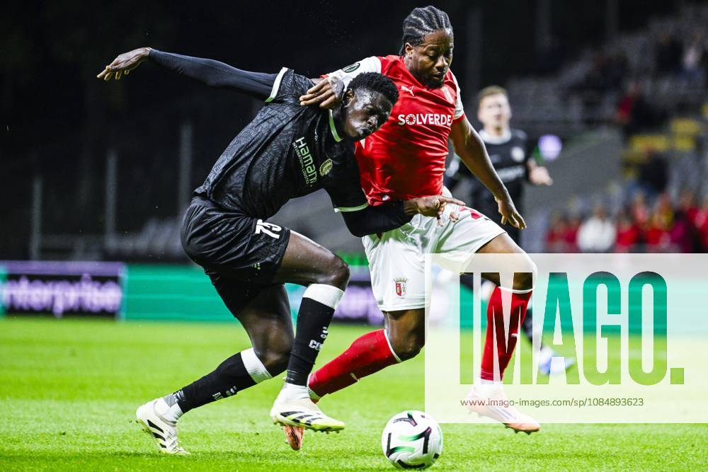 Ibrahimа Cisse of KAA Gent and Bright Arrey-Mbi of SC Braga pictured in action during a soccer game between Portuguese SC Braga and Belgian soccer team KAA Gent, Thursday 22 October 2026 in Braga, Portugal, the second match in the UEFA Conference League league phase. TOM GOYVAERTS TomxGoyvaerts x190689982x