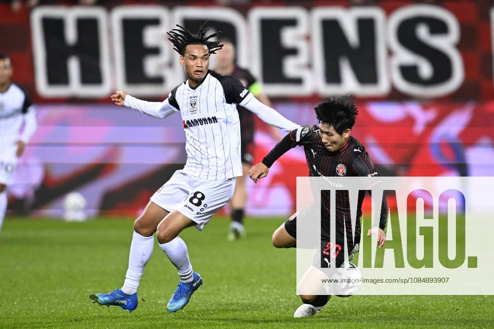 FC Midtjylland v Sint-Truidense VV - UEFA Conference League HERNING, DENMARK - OCTOBER 22 : Ishiwatari Nelson midfielder of Sint-Truidense VV and Hong Hyun-Seok midfielder of Midtjylland during the UEFA Conference League 2026 27 League Phase matchday 2 match between FC Midtjylland and Sint-Truidense VV on October 22, 2026 in Herning, Denmark, 22 10 2026 Herning Denmark