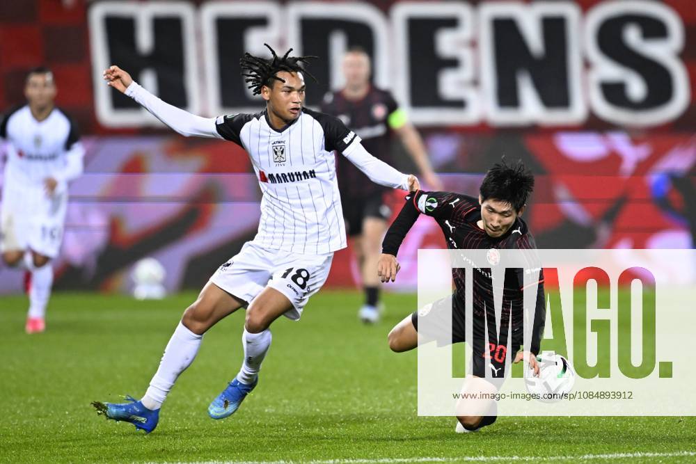 FC Midtjylland v Sint-Truidense VV - UEFA Conference League HERNING, DENMARK - OCTOBER 22 : Ishiwatari Nelson midfielder of Sint-Truidense VV and Hong Hyun-Seok midfielder of Midtjylland during the UEFA Conference League 2026 27 League Phase matchday 2 match between FC Midtjylland and Sint-Truidense VV on October 22, 2026 in Herning, Denmark, 22 10 2026 Herning Denmark