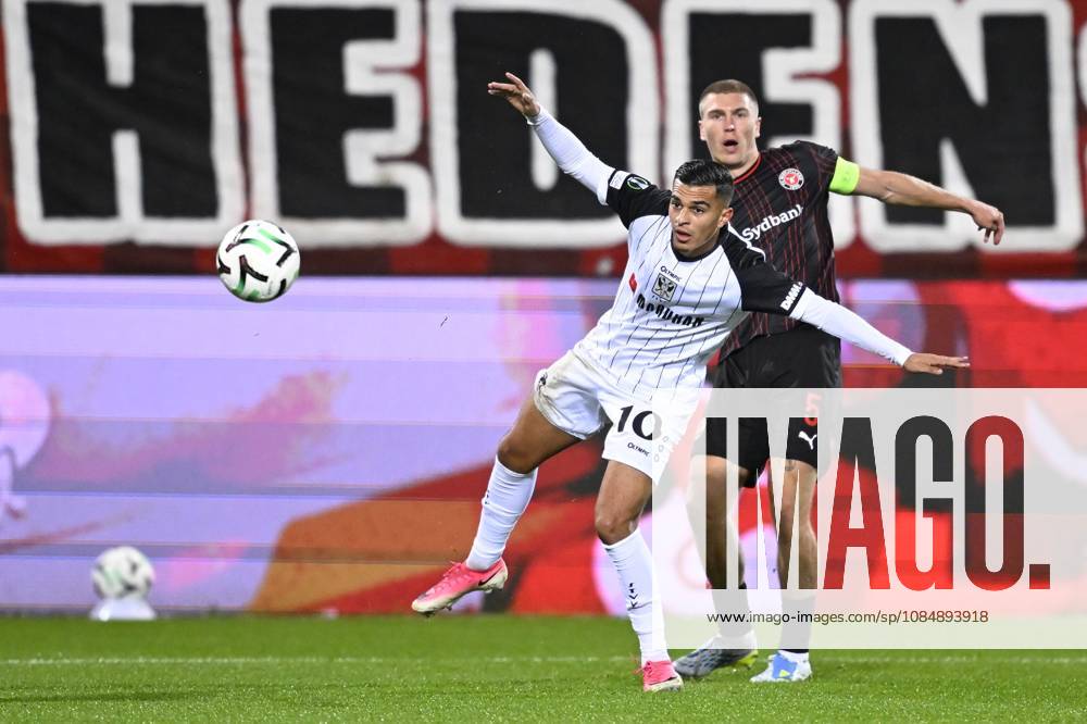 FC Midtjylland v Sint-Truidense VV - UEFA Conference League HERNING, DENMARK - OCTOBER 22 : Sebaoui Ilias forward of Sint-Truidense VV and Kristensen Rasmus defender of Midtjylland during the UEFA Conference League 2026 27 League Phase matchday 2 match between FC Midtjylland and Sint-Truidense VV on October 22, 2026 in Herning, Denmark, 22 10 2026 Herning Denmark