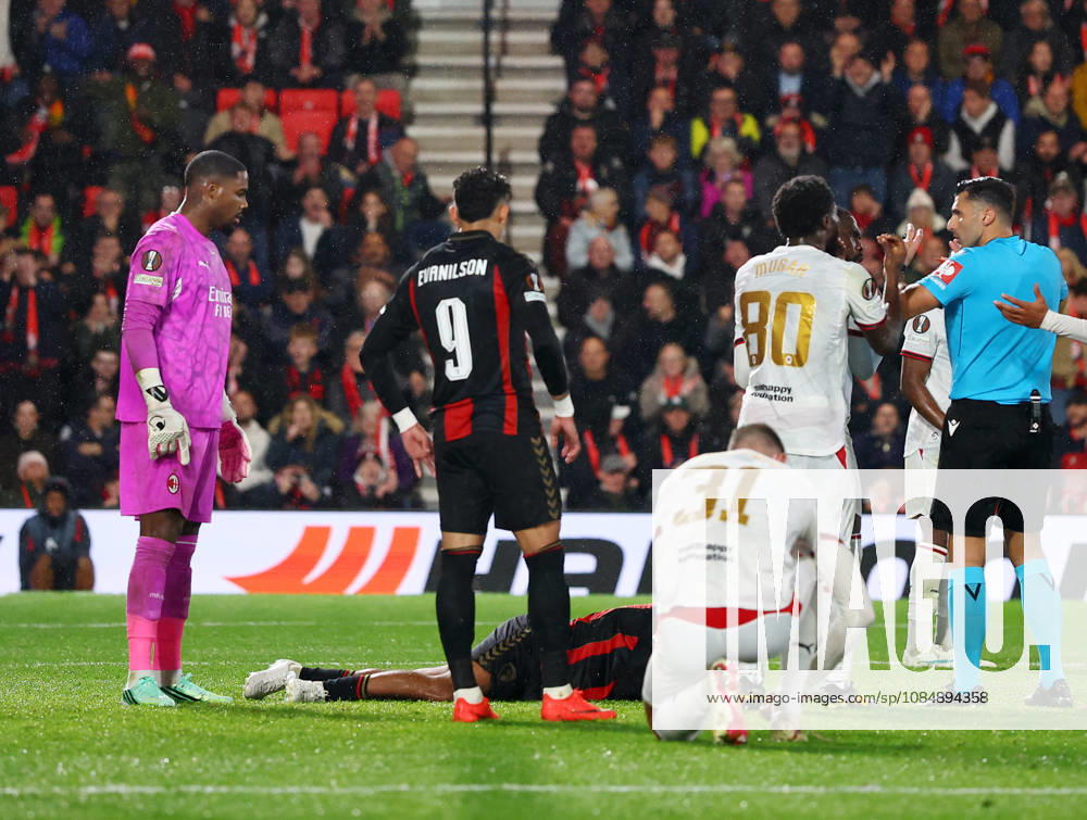 Bournemouth, England, 22nd October 2026. Mike Maignan of AC Milan stares at Tyler Adams of Bournemouth lying on the ground after he pushed him in the face during the AFC Bournemouth vs AC Milan UEFA Europa League match at the Vitality Stadium, Bournemouth. Picture credit should read: Paul Terry Sportimage . SPI_036_PT_Bournmouthmouth_AC_Milan SPI-5092-0036