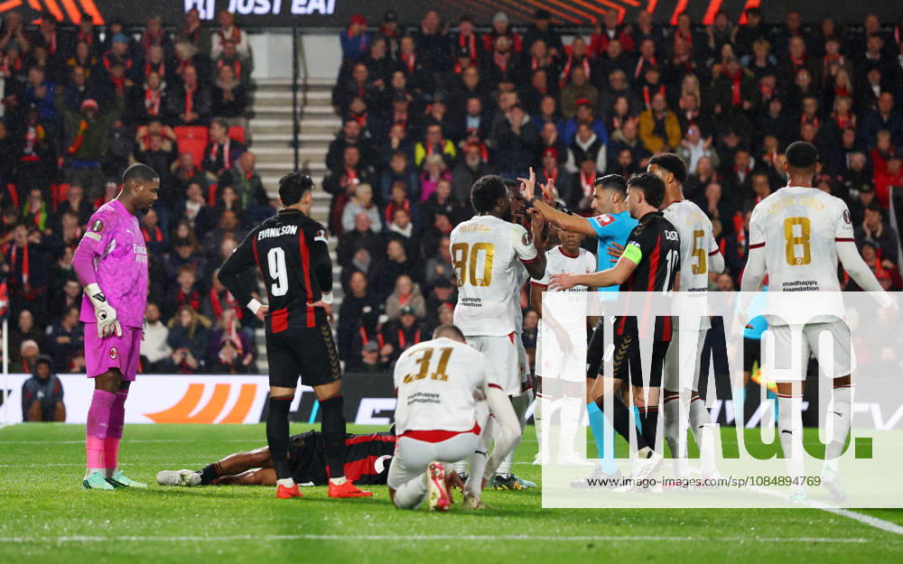 Bournemouth, England, 22nd October 2026. Referee Vassilis Fotias brandishes a red card to Mike Maignan of AC Milan after he pushed Tyler Adams of Bournemouth in the face during the AFC Bournemouth vs AC Milan UEFA Europa League match at the Vitality Stadium, Bournemouth. Picture credit should read: Paul Terry Sportimage . SPI_040_PT_Bournmouthmouth_AC_Milan SPI-5092-0040