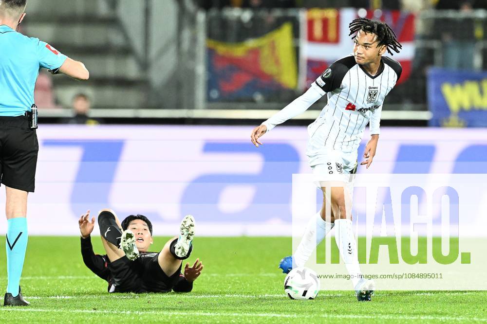 Midtjylland s Huyn-Seok Hong and STVV s Nelson Ishiwatari pictured in action during a soccer game between Danish FC Midtjylland and Belgian Sint-Truidense VV, Thursday 22 October 2026 in Herning, Denmark, on the second day of the UEFA Conference League league phase. JILLxDELSAUX x190692064x