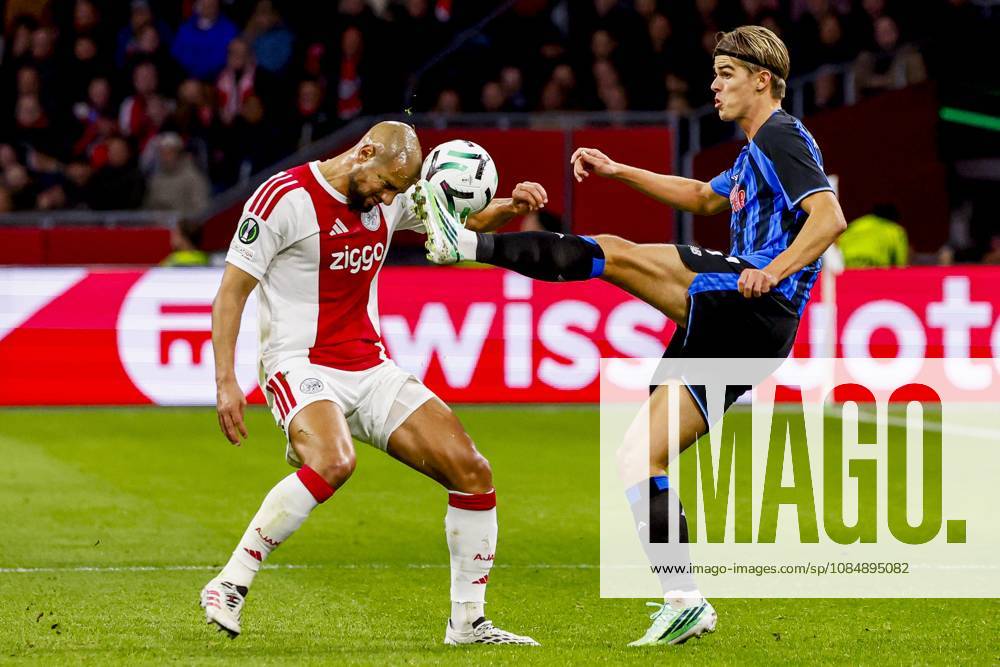 AMSTERDAM - Sofyan Amrabat of AFC Ajax battles for possession with Charles De Ketelaere of Atalanta BC during the UEFA Conference League match between AFC Ajax and Atalanta BC at the Johan Cruijff ArenA on October 22, 2026 in Amsterdam, the Netherlands. WART BRINKERHOF ANP Conference League 2026 27 ANPxSportx xMarcelxterxBalsxIVx 573296825 originalFilename: 573296825