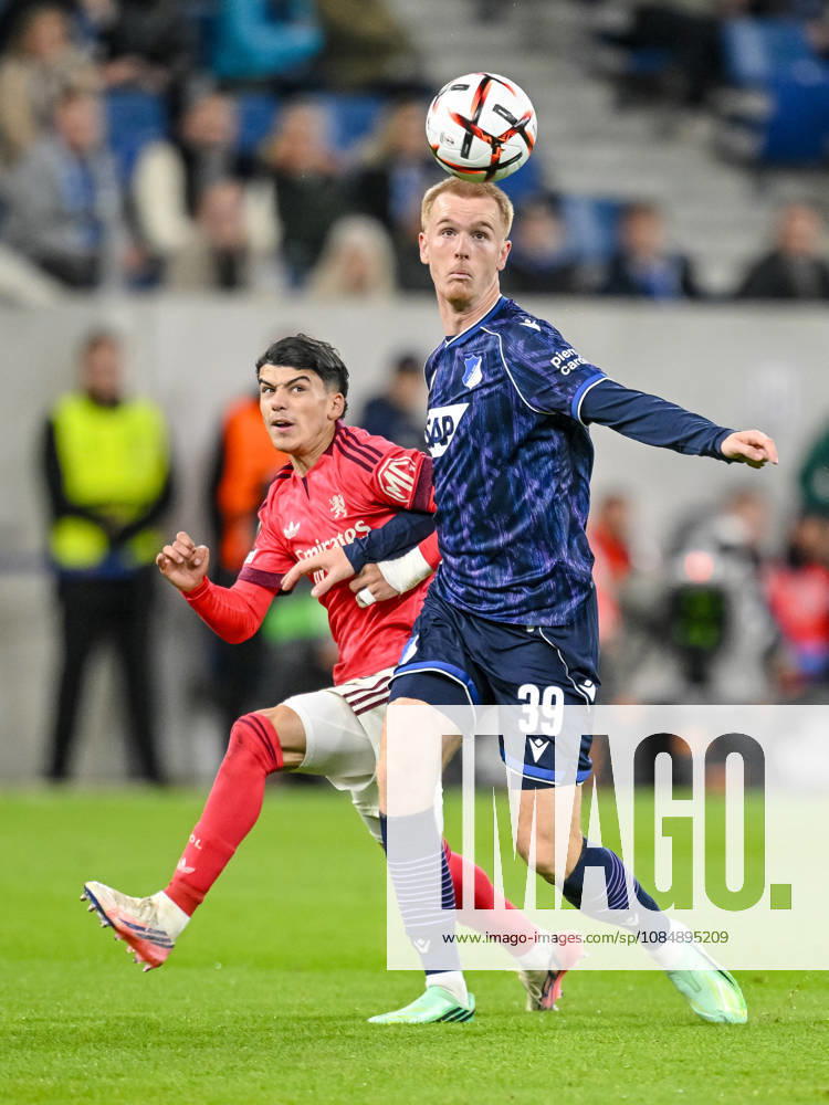 Kail Boudache (Olympique Lyon) and Mats Rots (TSG 1899 Hoffenheim) battle for the ball during the UEFA Europa League 2026 27 League Phase match between TSG 1899 Hoffenheim and Olympique Lyonnais at Rhein-Neckar-Arena on October 22, 2026 in Sinsheim, Germany. (Photo by Harry Langer DeFodi Images) -