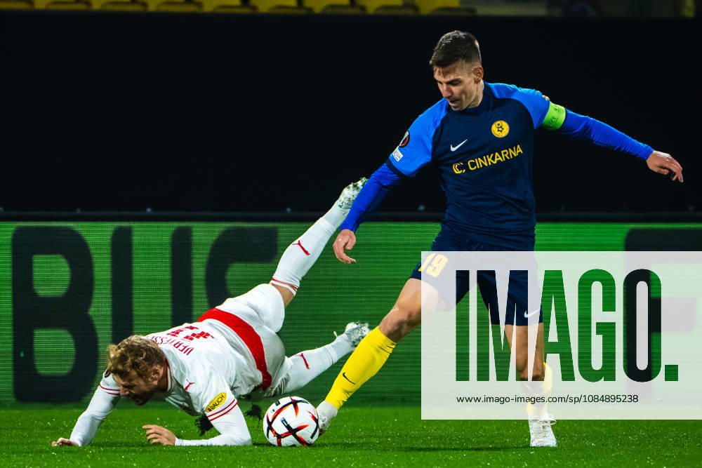Mark Zabukovnik of Celje (R) in action against Yorbe Vertessen of Salzburg (R) during the UEFA Europa League match between Celje (Slovenia) and Salzburg (Austria) at Stadion Celje, Celje on October 22, 2026 in Celje, Slovenia. (Photo by Andraz Corel Sports Press Photo).