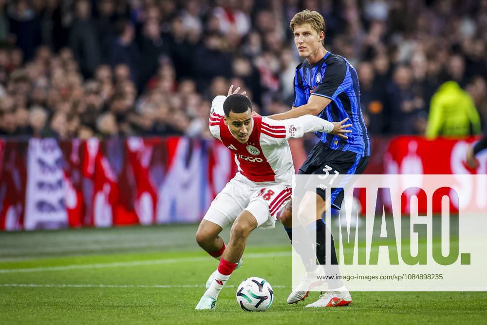 , JohanCruijff ArenA , season 2026 2027 , UEFA Conference League , League phase - Matchday 3 football , match between Ajax and Atalanta , Picture shows Ajax player Abdellah Ouazane and Atalanta player Thomas Kristensen Ajax - Atalanta x208964792x